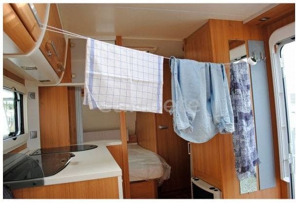 tendedero-en-caja-enrollable-colgador-ropa-bañador-playa-camping-camper-caravana-autocaravana-1